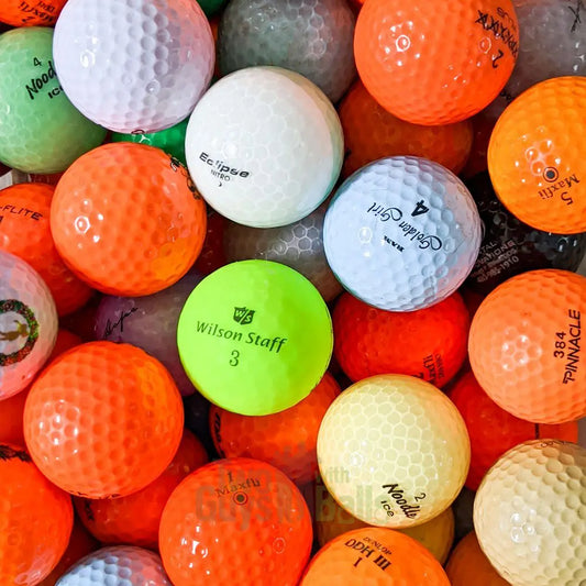 Assorted Coloured used golf balls.